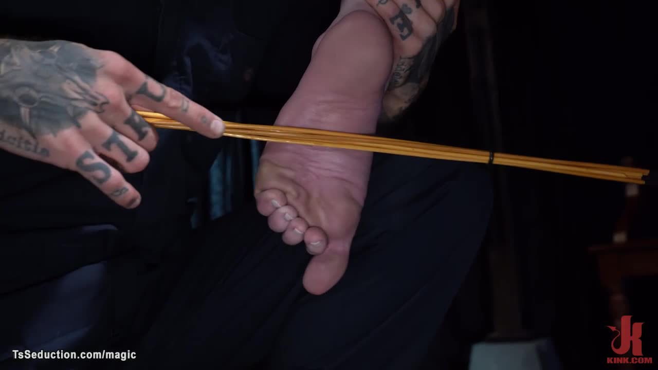 Trans slave bound and feet caned